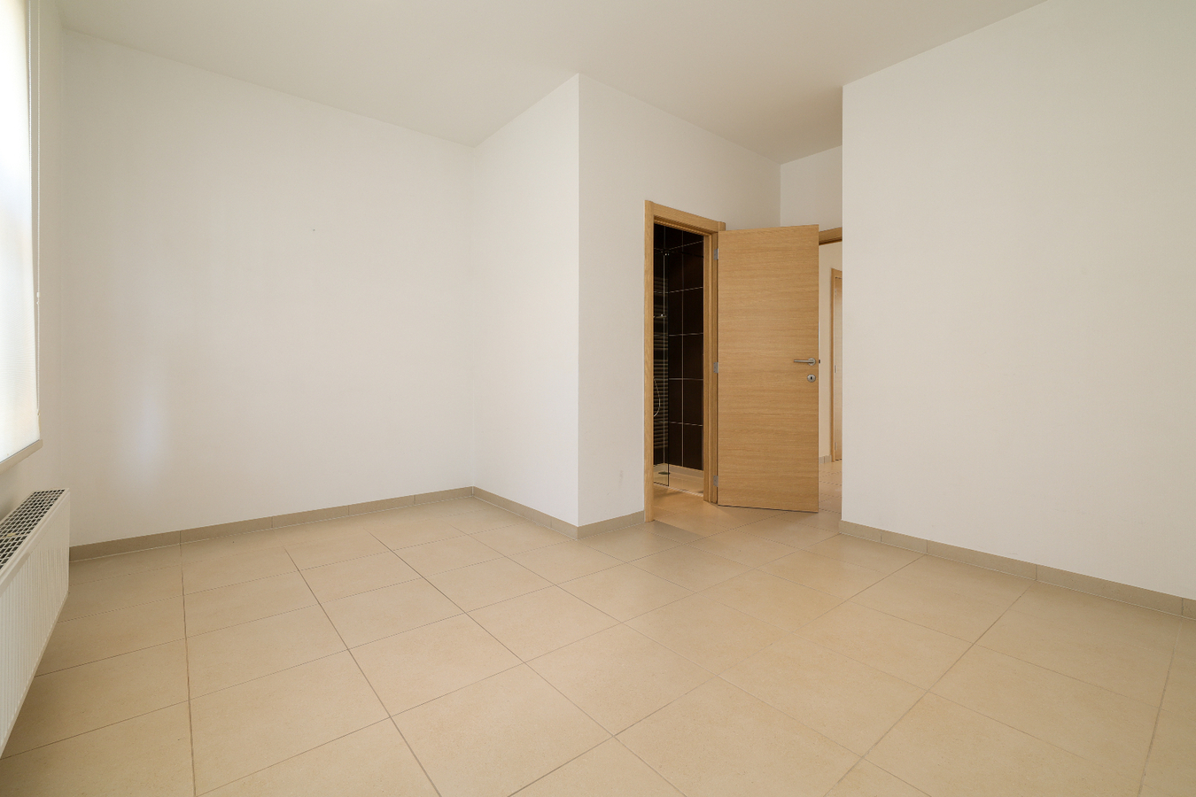 Gelijkvloers appartement met garagebox op uitstekende ligging 