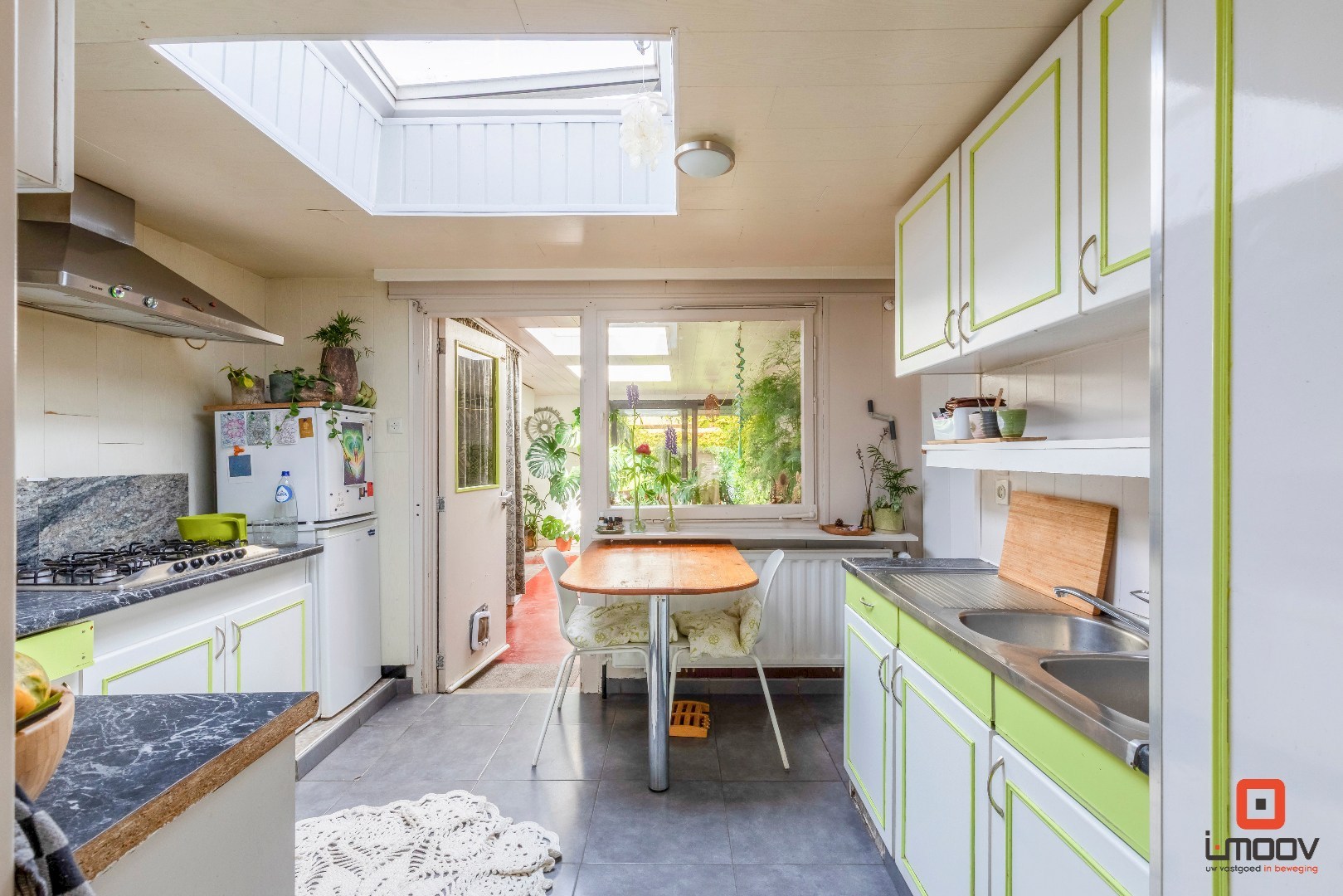Karaktervolle tuinwijkwoning met unieke architectuur en garage te Gentbrugge 