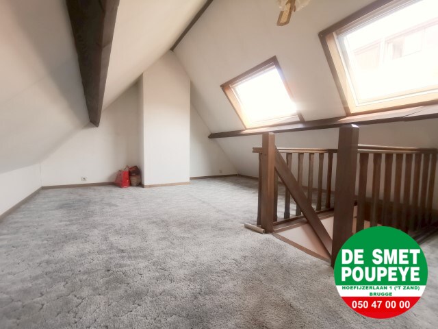 Rijwoning met gemeenschappelijk terras 