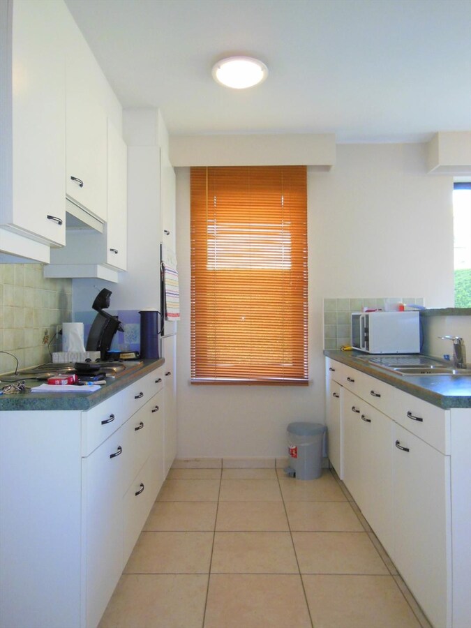 Gezellig gelijkvloersappartement met zonnige tuin en garage 