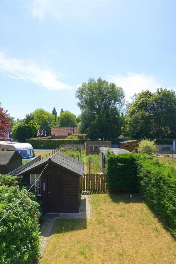 Ruime rijwoning met garage 