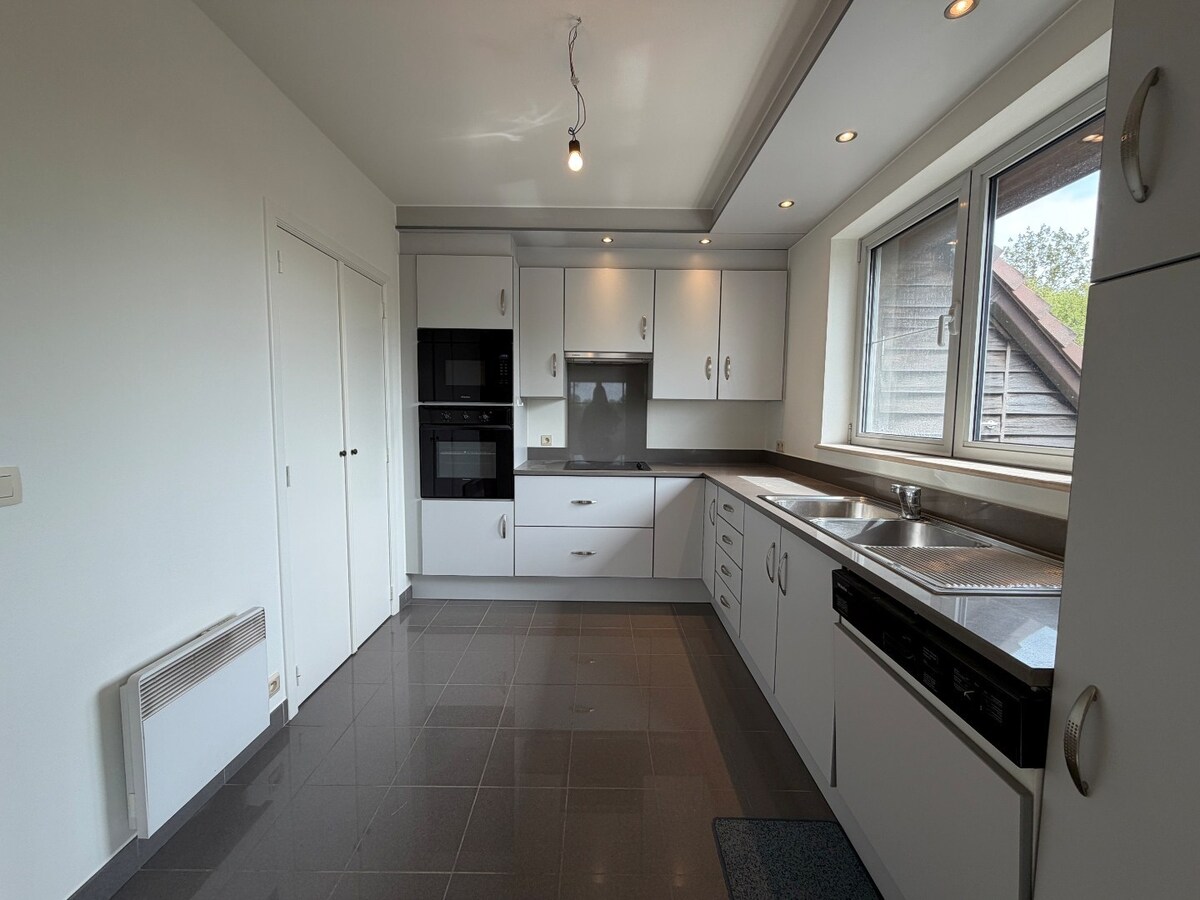 Ruim appartement met 2 terrassen nabij de Schelde. 