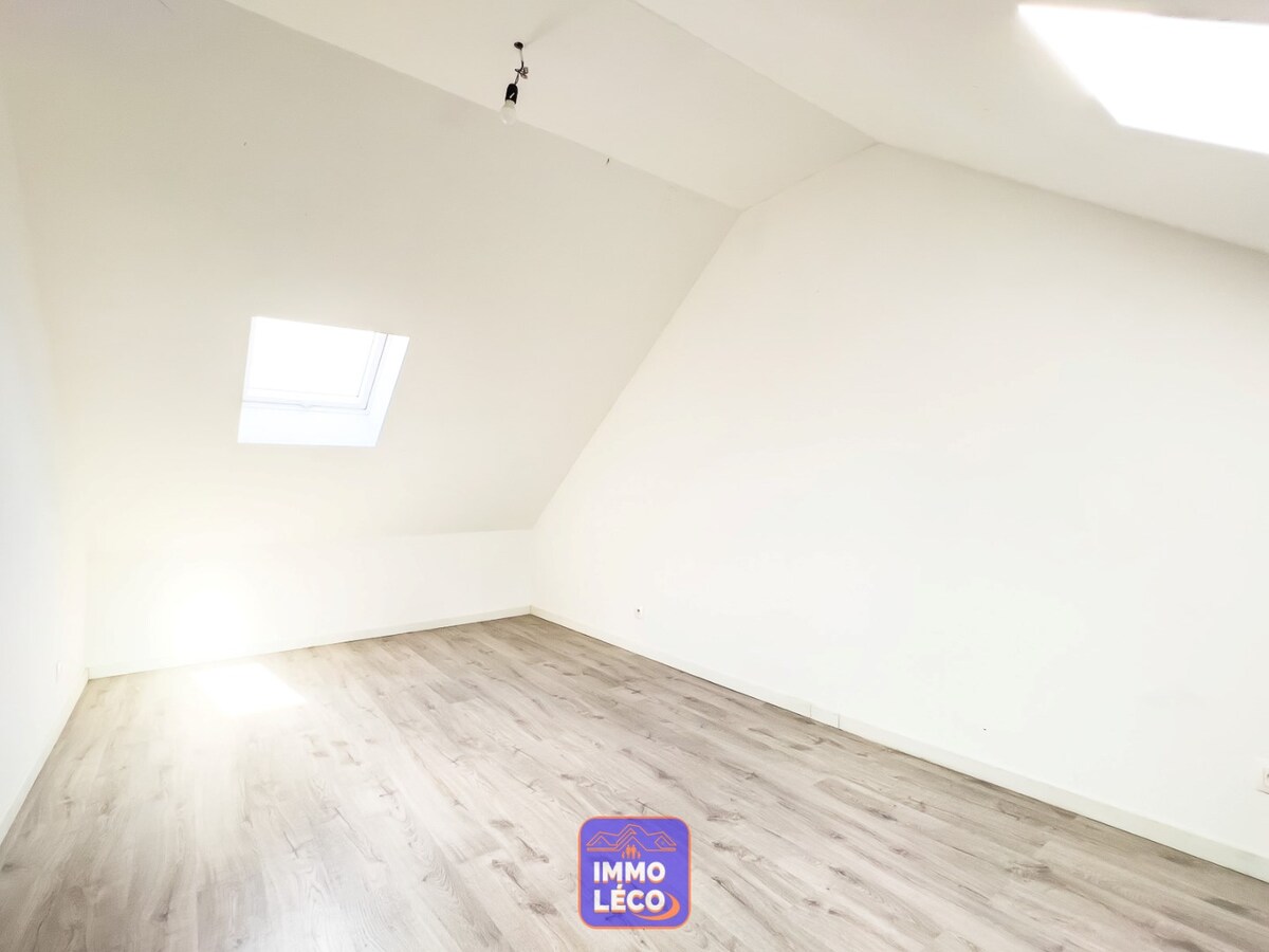 Appartement « DUPLEX » avec garage, idéalement situé 