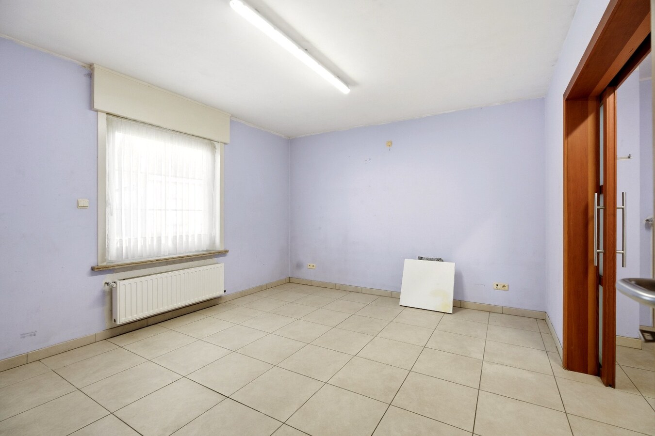 Ruime halfopen woning met 5 slaapkamers te koop in Werken met garage en ruime tuin! 