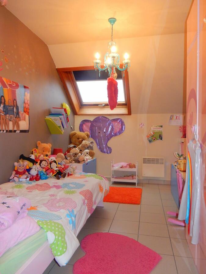 Gezellige rijwoning met tuin en een dubbele garage 