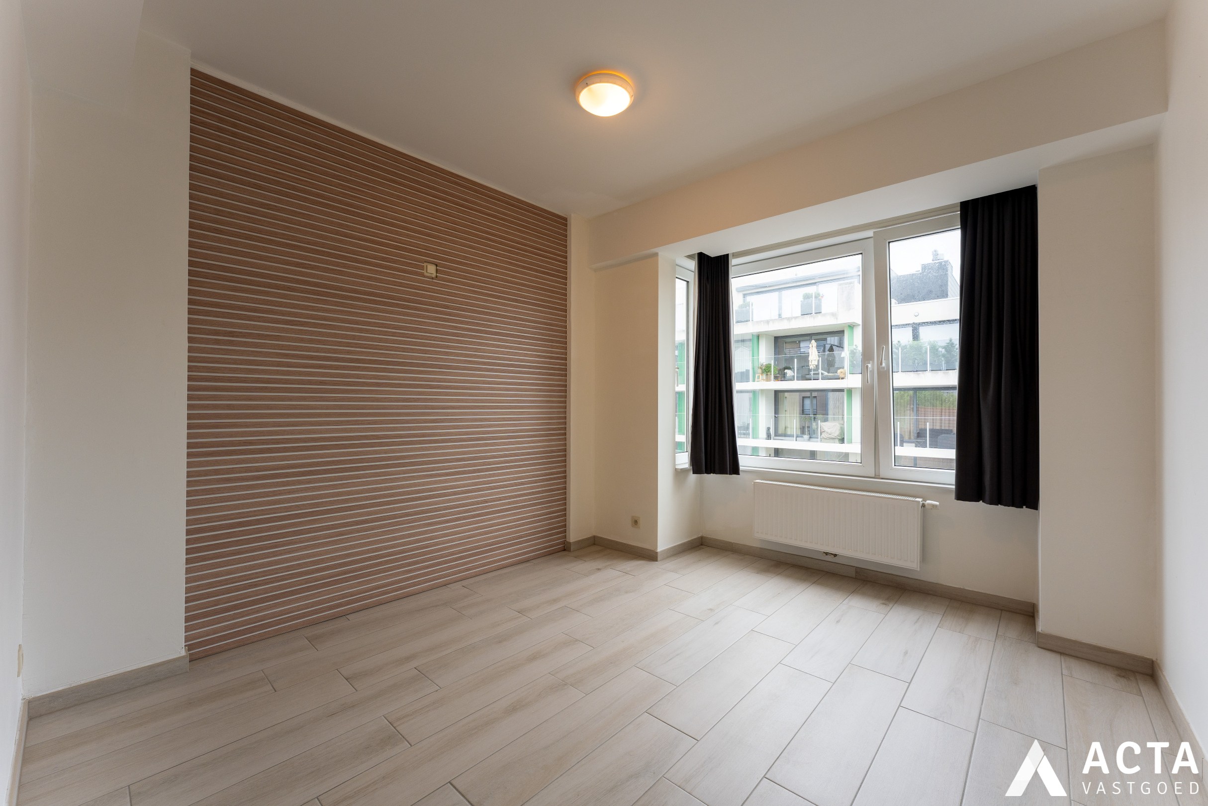Instapklaar appartement met twee slaapkamers en parkzicht. 