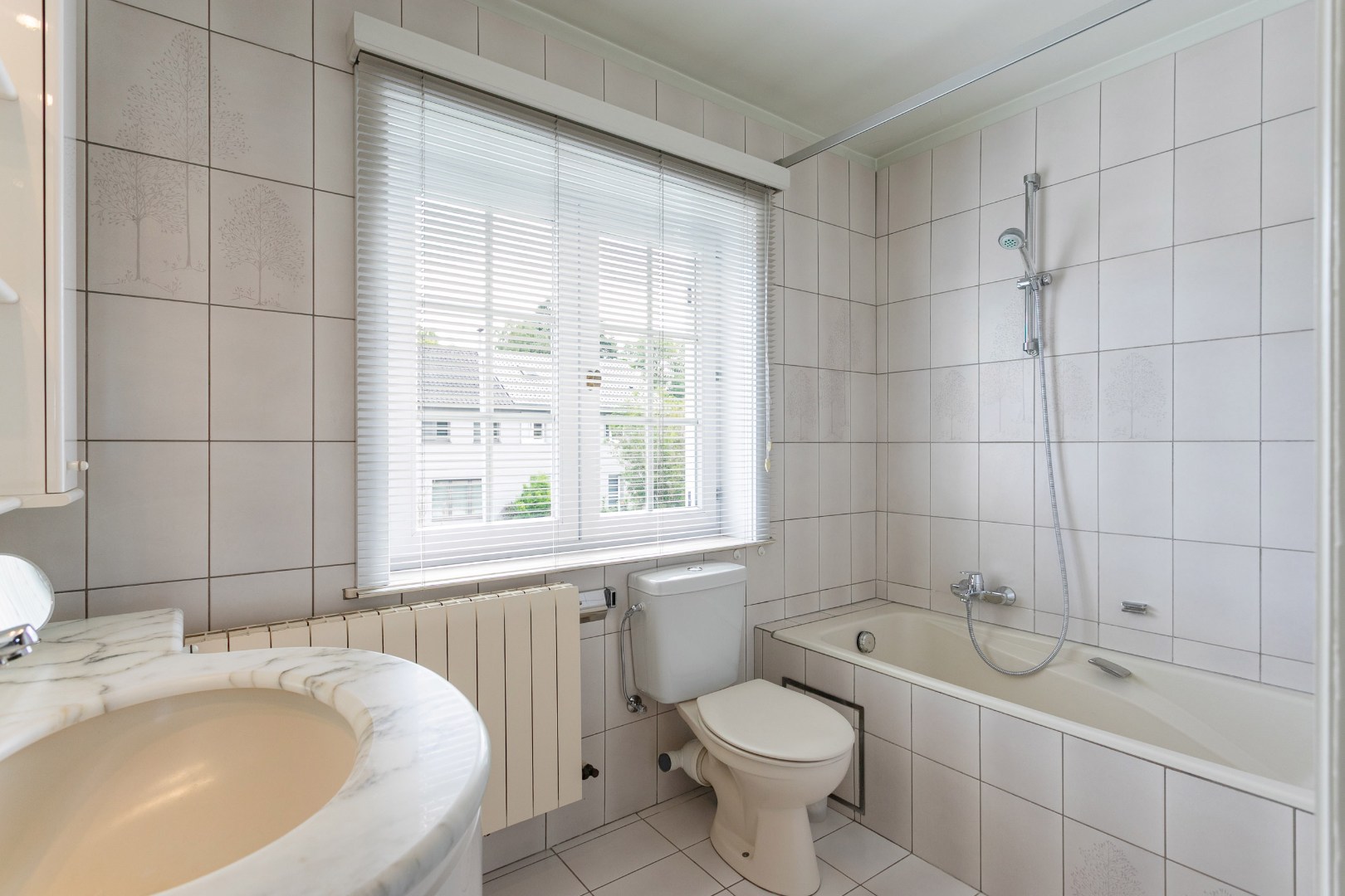 Solide woning (EPC:C) met 3 slpk, tuin en ruime garage 
