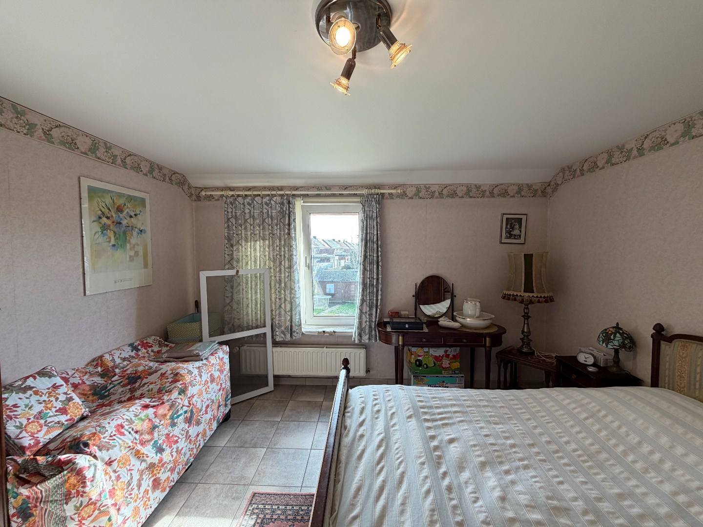 Halfopen woning met 3 slaapkamers,  garage en een ruime tuin te Zulte 