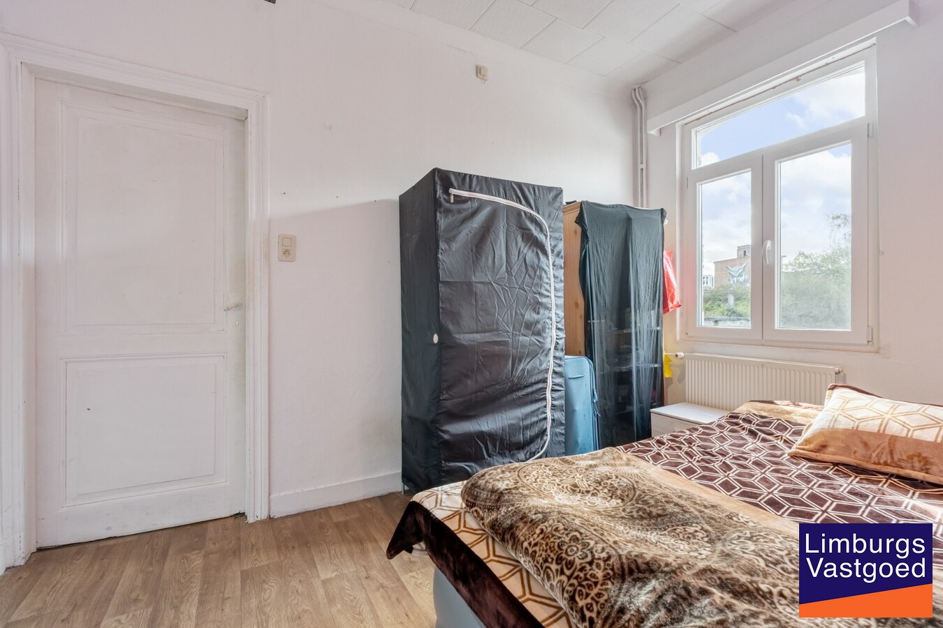 Deels gerenoveerde woning met stadstuin, 3 slpk, 2a60ca, tussen de kleine en grote ring 