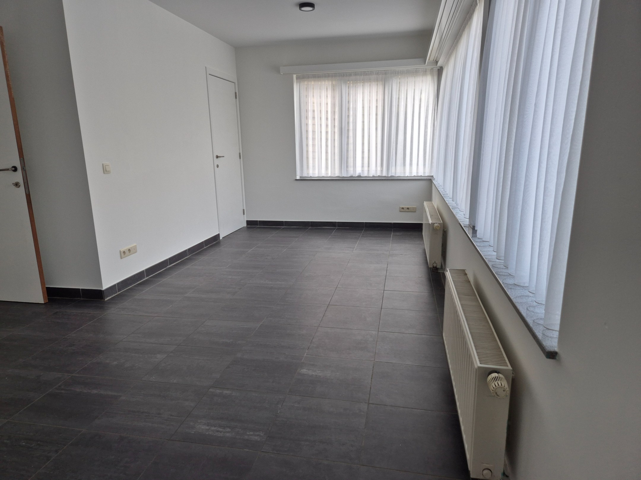 Gelijkvloers appartement met 1 slaapkamer en terras 