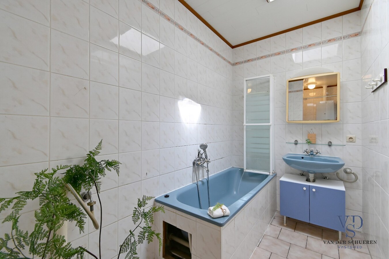 Knusse starterswoning met koertje 