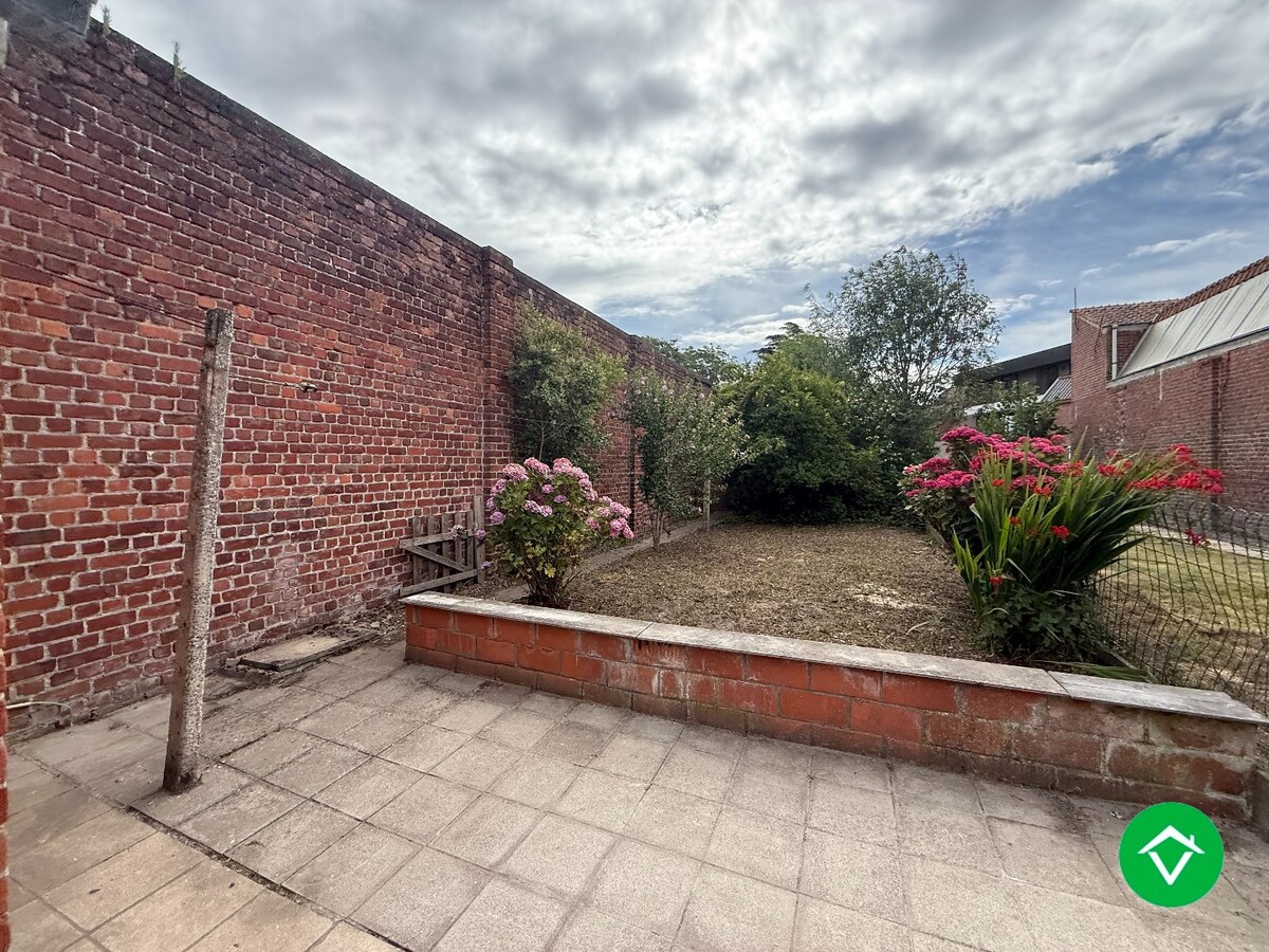 Gezellige rijwoning met 3 slaapkamers en tuin te centrum Roeselare 