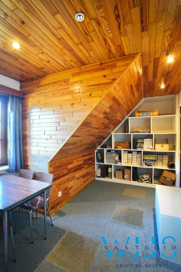 Fantastische open bebouwing met dubbele garage in gegeerde woonwijk te Evergem 