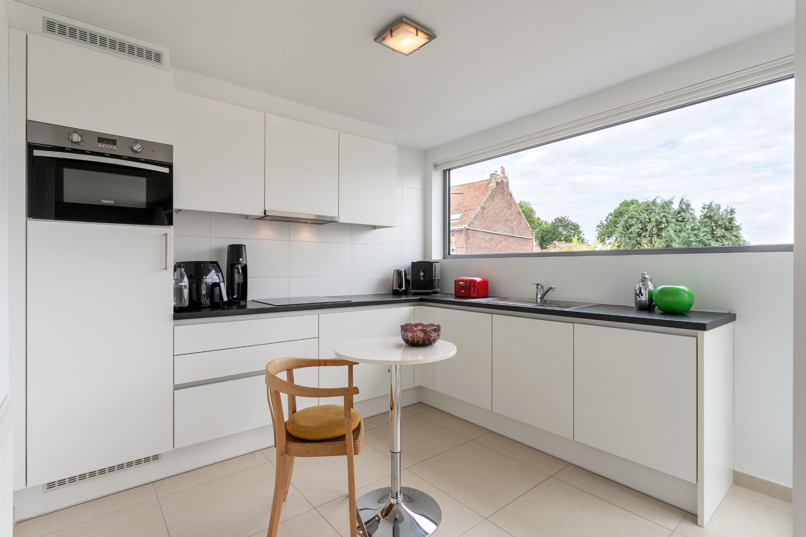 Instapklaar duplex app. met garageboxen te Beersel 