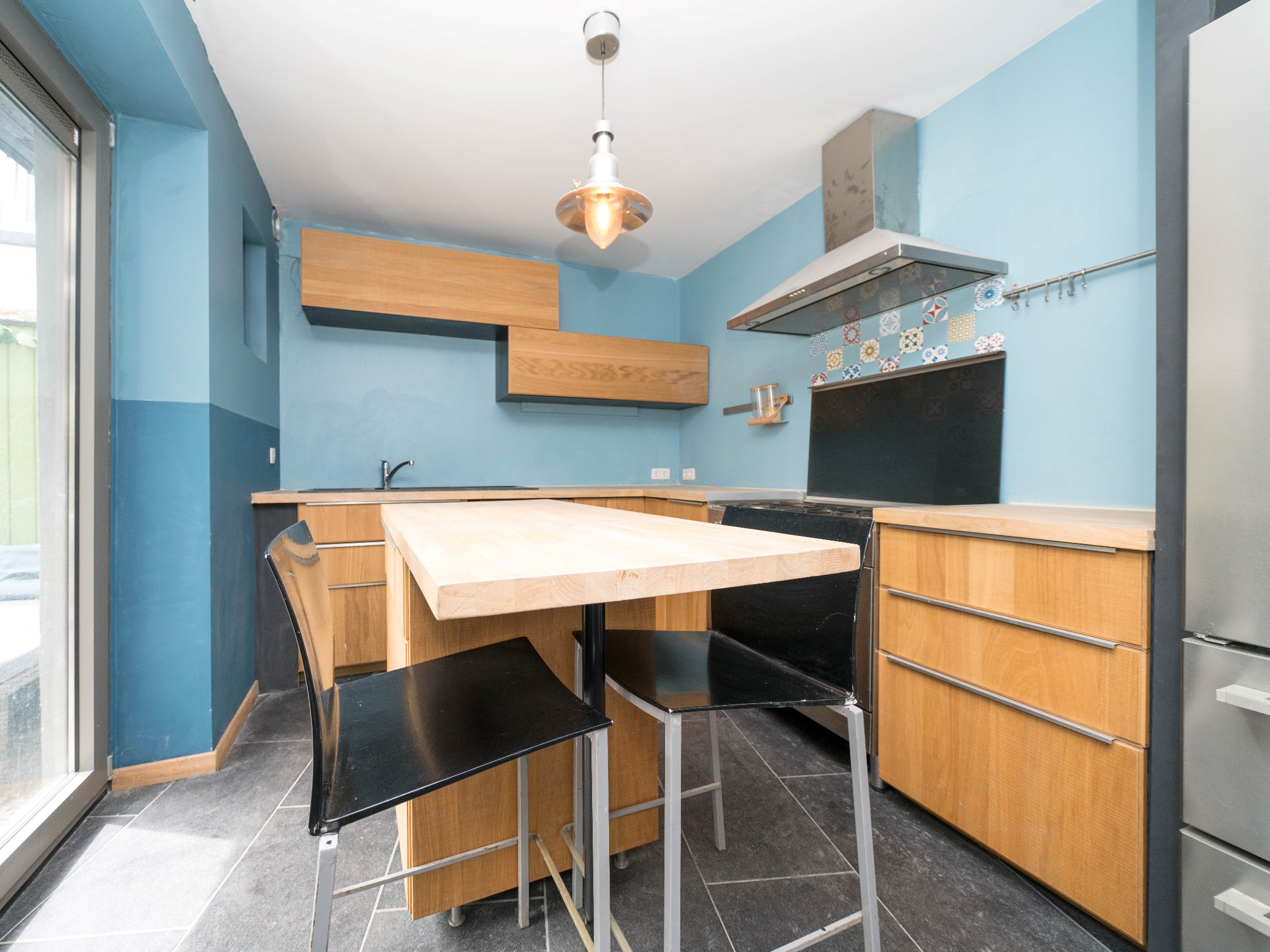 Gerenoveerde woning met 4 kamers, garage en stadstuintje 