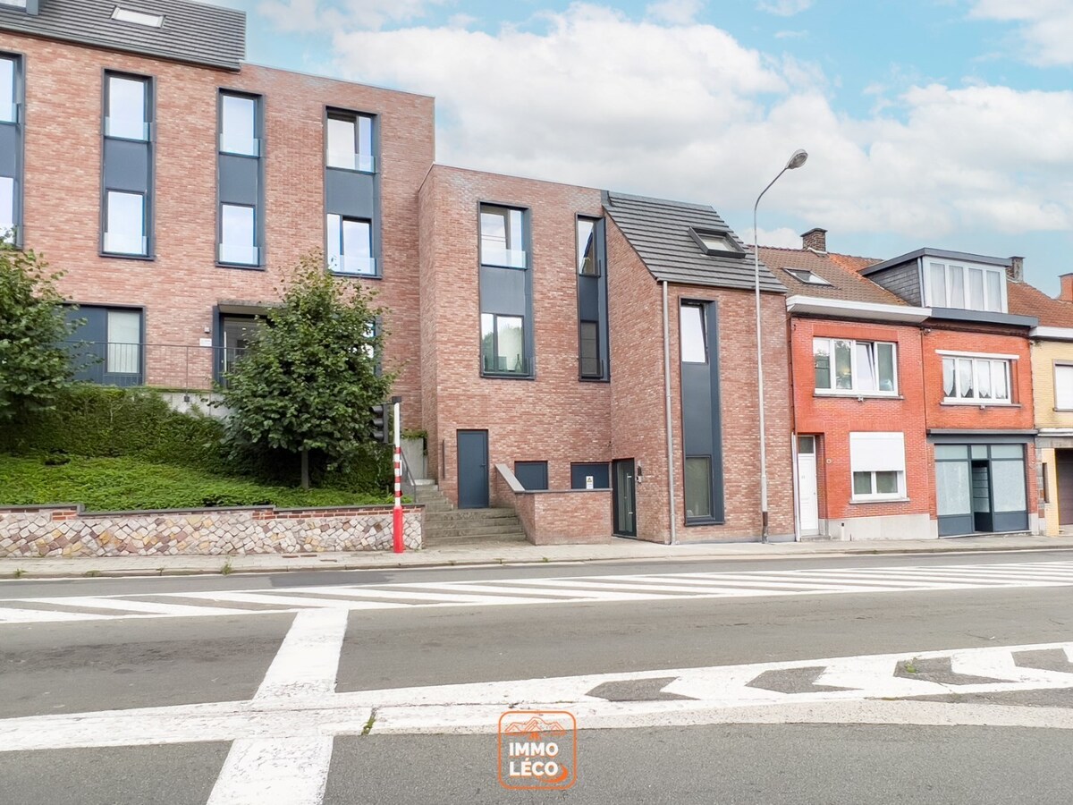 Appartement moderne avec terrasse et parking privé, en face du parc de Mouscron ! 