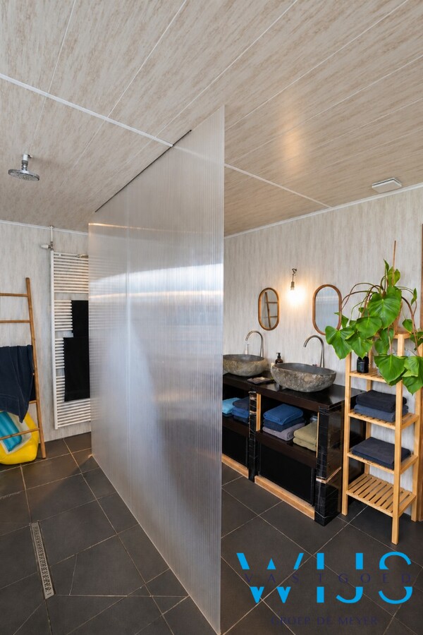 Gerenoveerde woning met ruime tuin in Doornzele/Desteldonk 