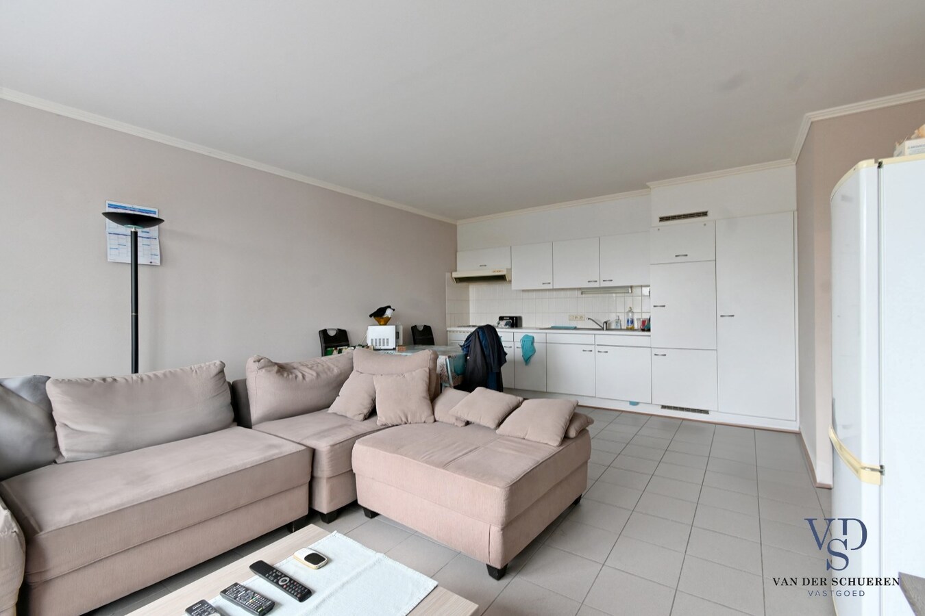 Degelijk investeringsappartement met garage. 