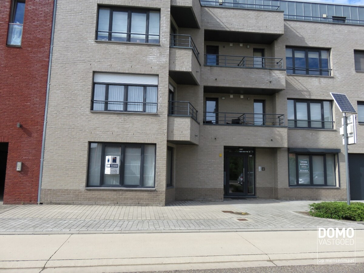 Gelijkvloers appartement met tuin en ondergrondse garage te Kermt - energielabel B -121m² bewoonbare oppervlakte 