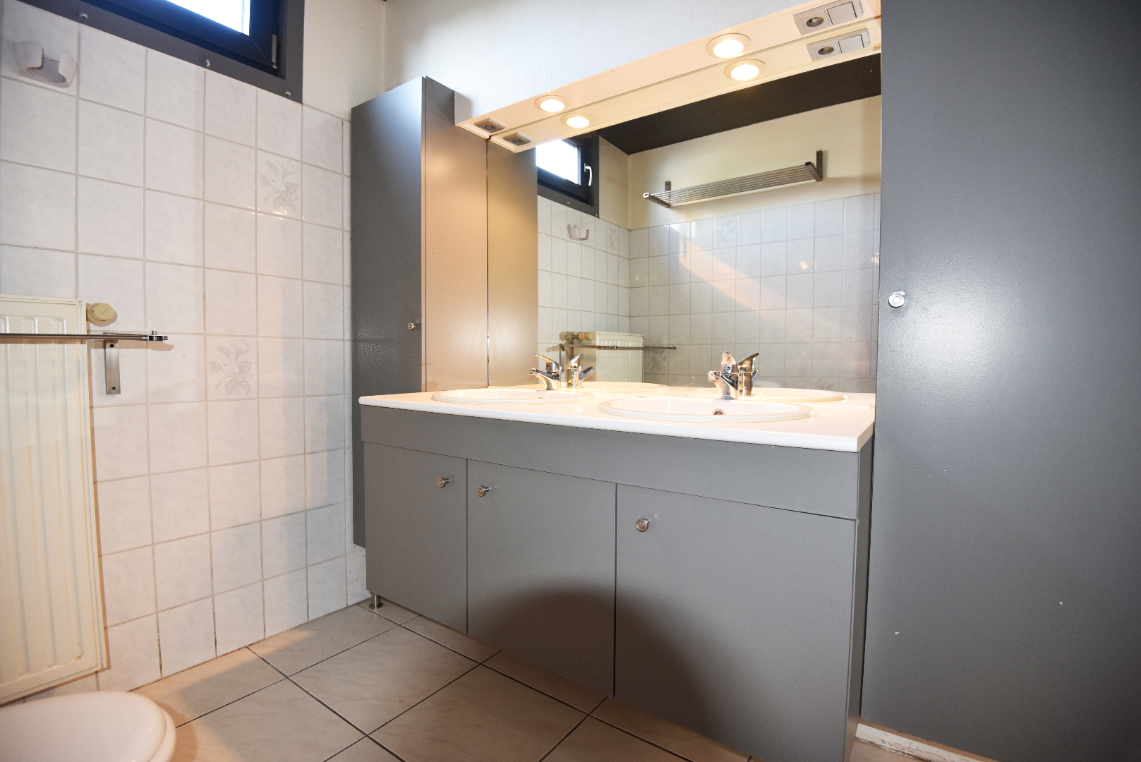 Op te frissen woning met 2 slpks, garage (55m²) en tuin te Balgerhoeke 