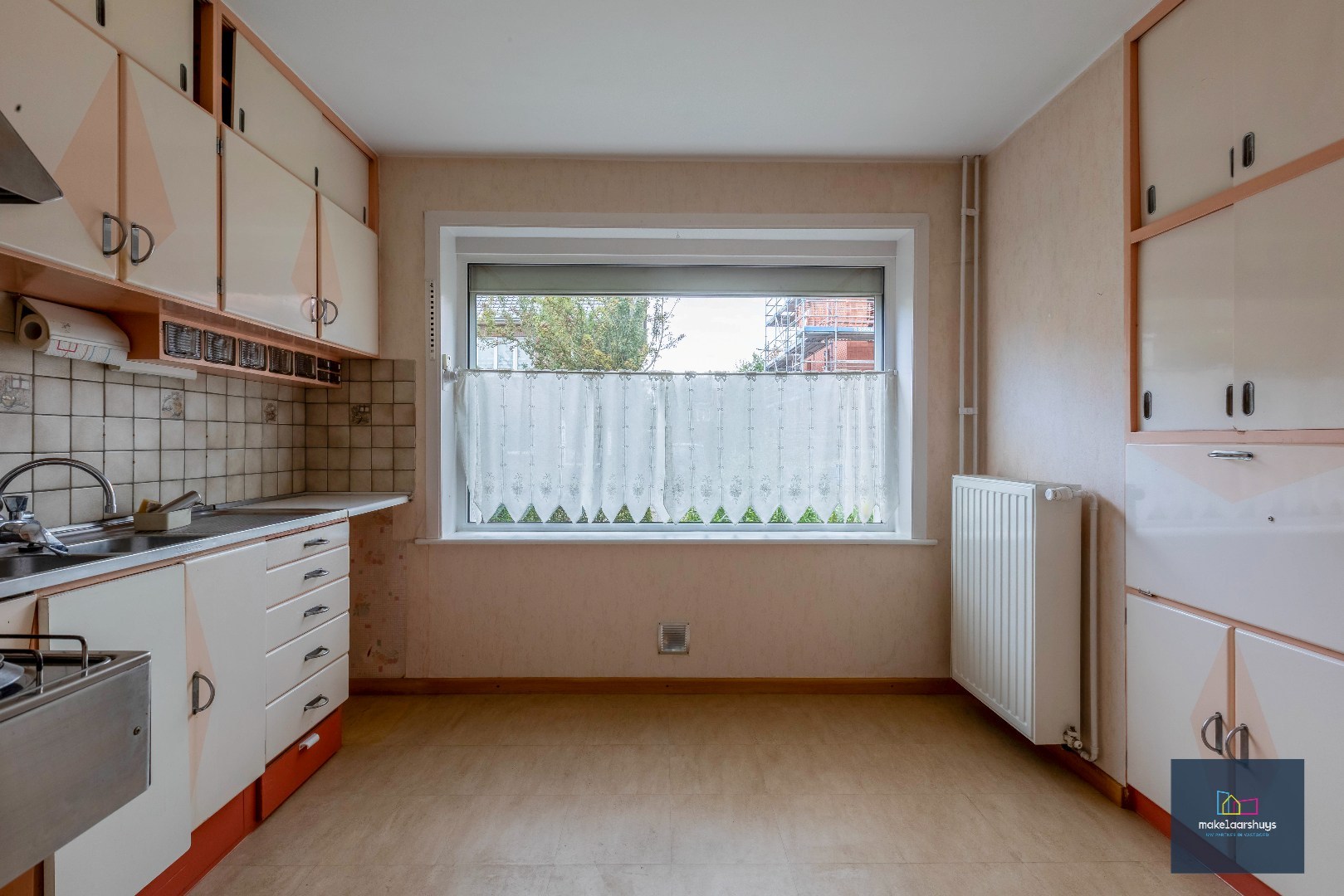 Gunstig gelegen woning met tuin en garage 