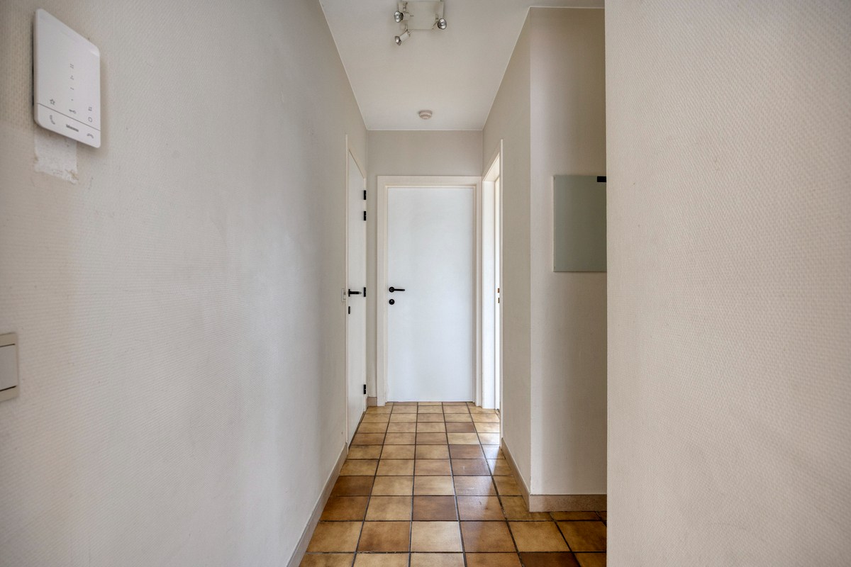 Opbrengsteigendom met 3 appartementen en 7 garages 