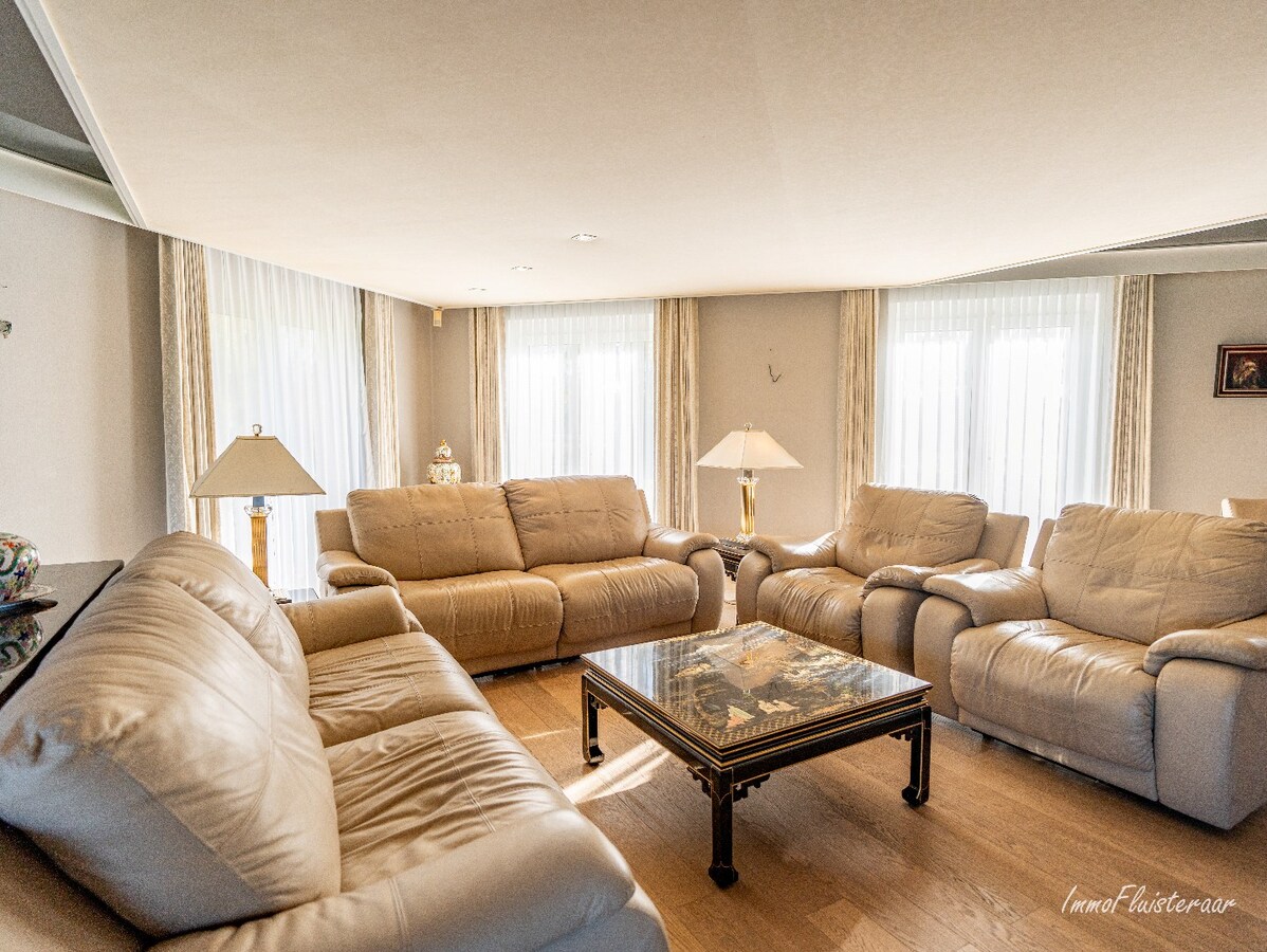 Rural villa with multifunctional outbuilding on approximately 51 acres in Bilzen 