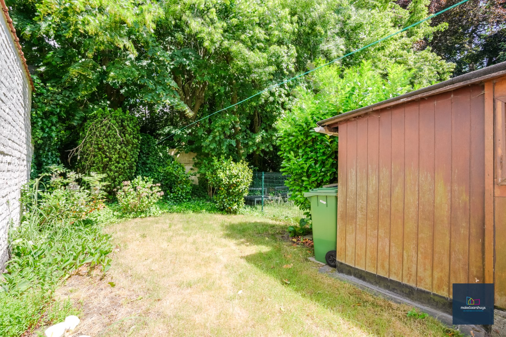 Centraal gelegen te renoveren woning in rij met tuin te Mariakerke 