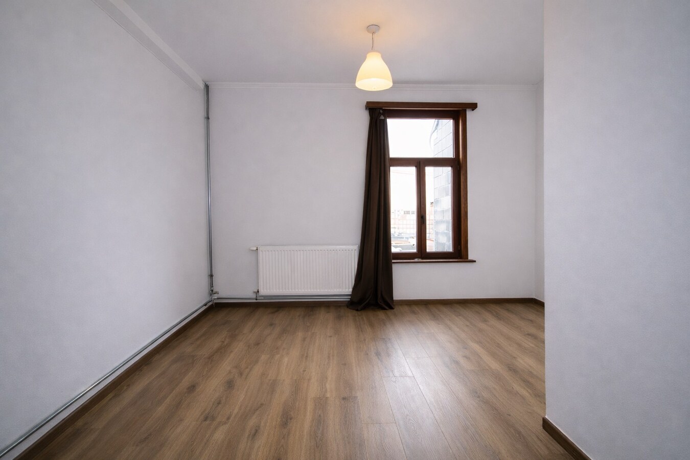 Te koop: Centraal gelegen woning met twee slaapkamers, zolderverdieping, EPC label C én tuin in Sint-Niklaas! 