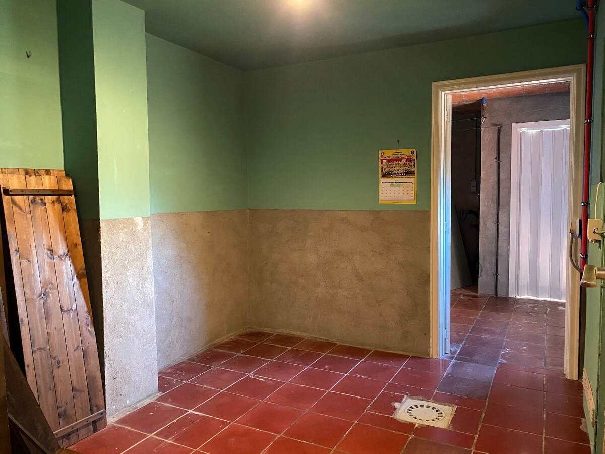 Ruime halfopen woning met garage, 3 slaapkamers en tuin 