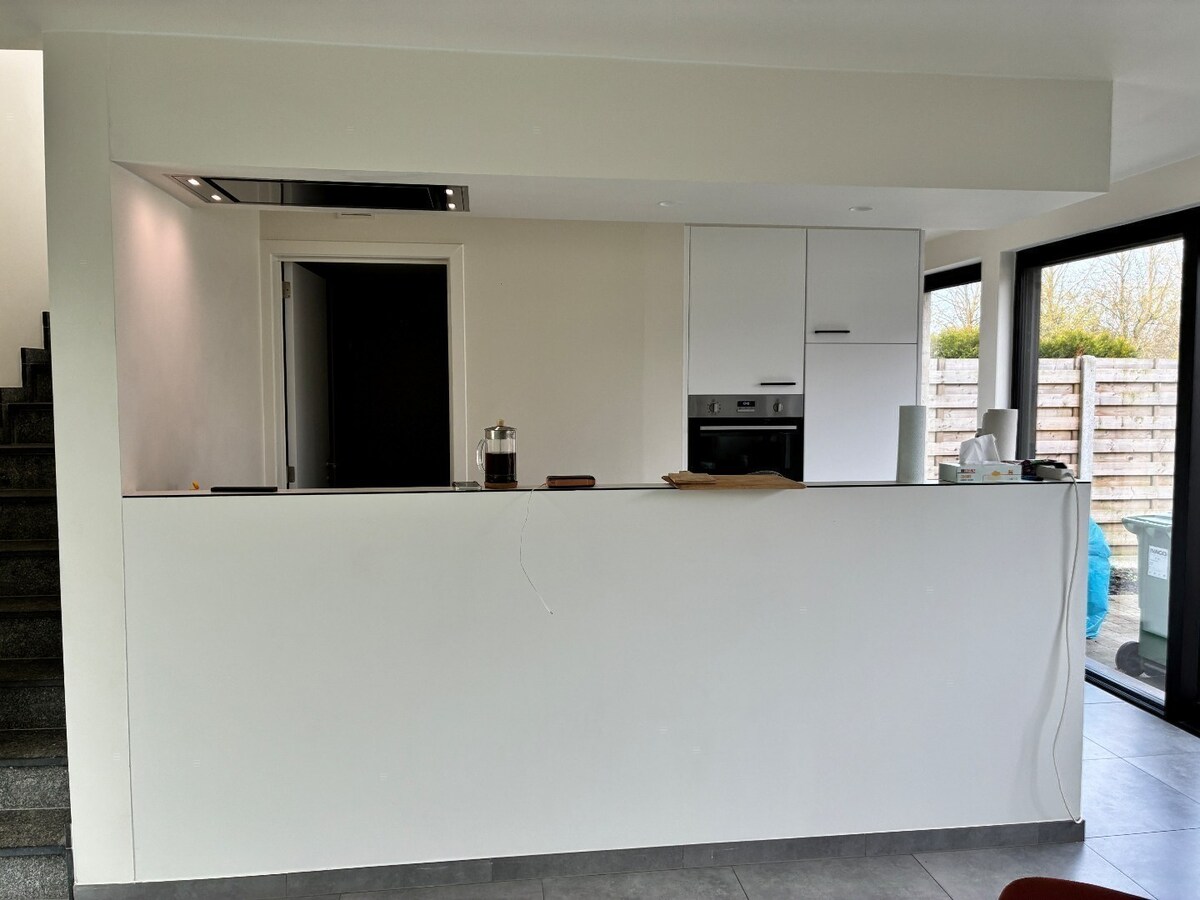 Nieuwbouwwoning op 50m van tramhalte - met terras en tuin ! 