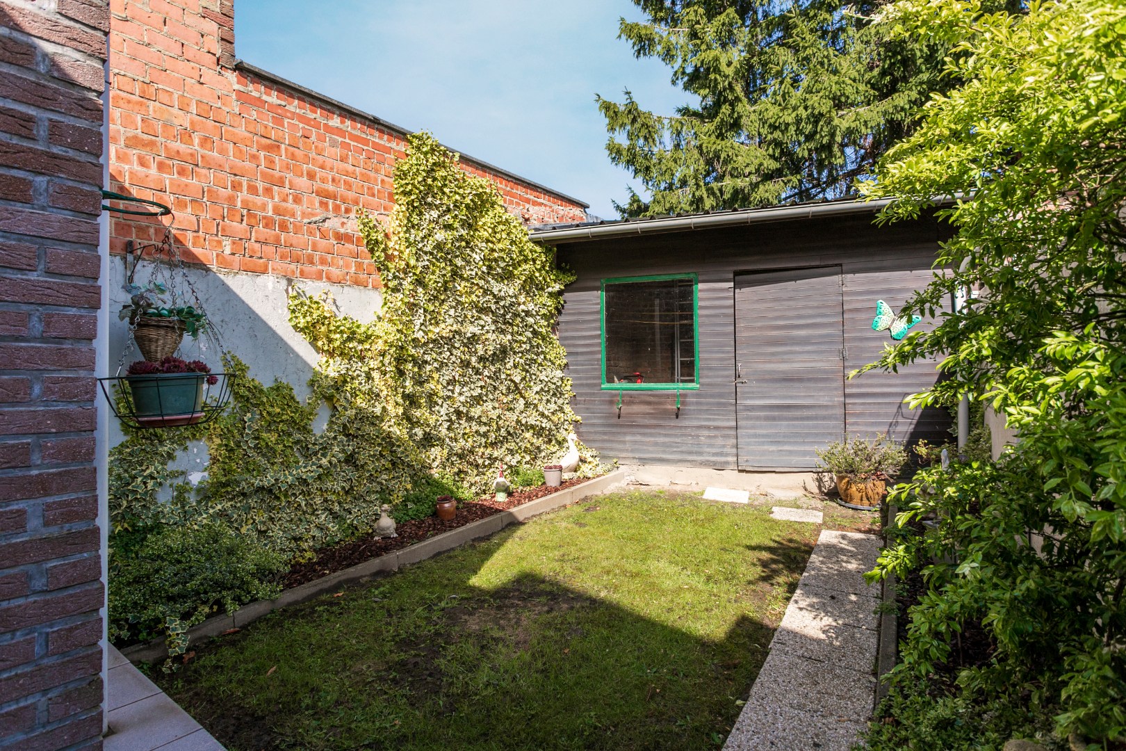 Verzorgde woning met 3 slaapkamers en leuke tuin te Halle 
