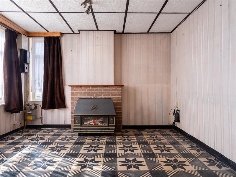 Charmante halfopen woning te Watervliet met potentieel. 