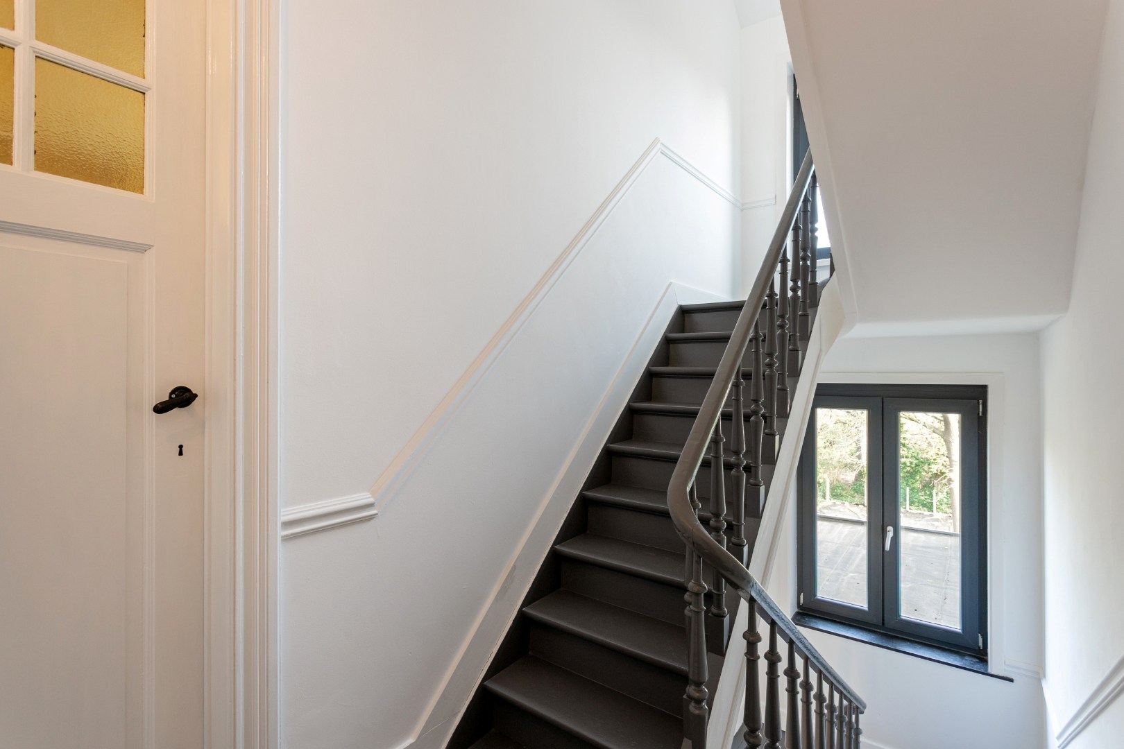 Handelshuis met woongedeelte, garage en tuin 