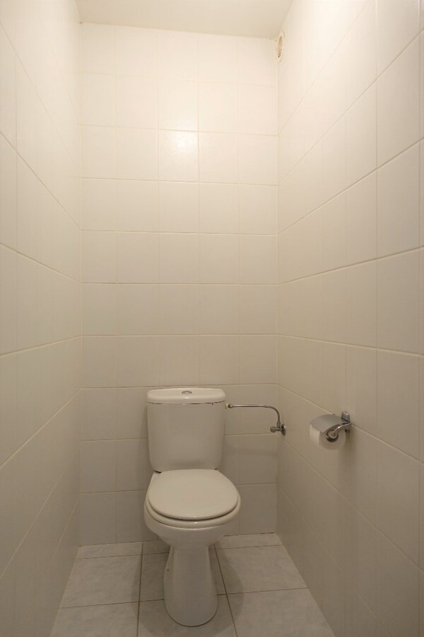 Lichtrijk duplex-appartement met garage in het centrum 