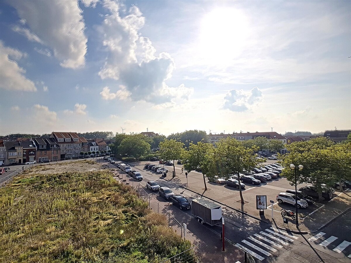 Dakppartement aan het marktplein te Heist 