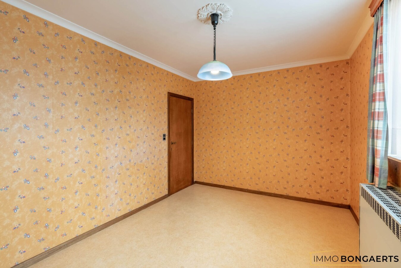 Ruime woning met tuin, garage en 3 slaapkamers in Genk. 