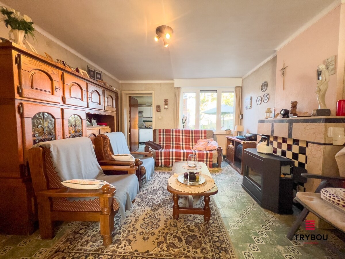 Ruime gezinswoning met 4 slaapkamers, garage en tuin 