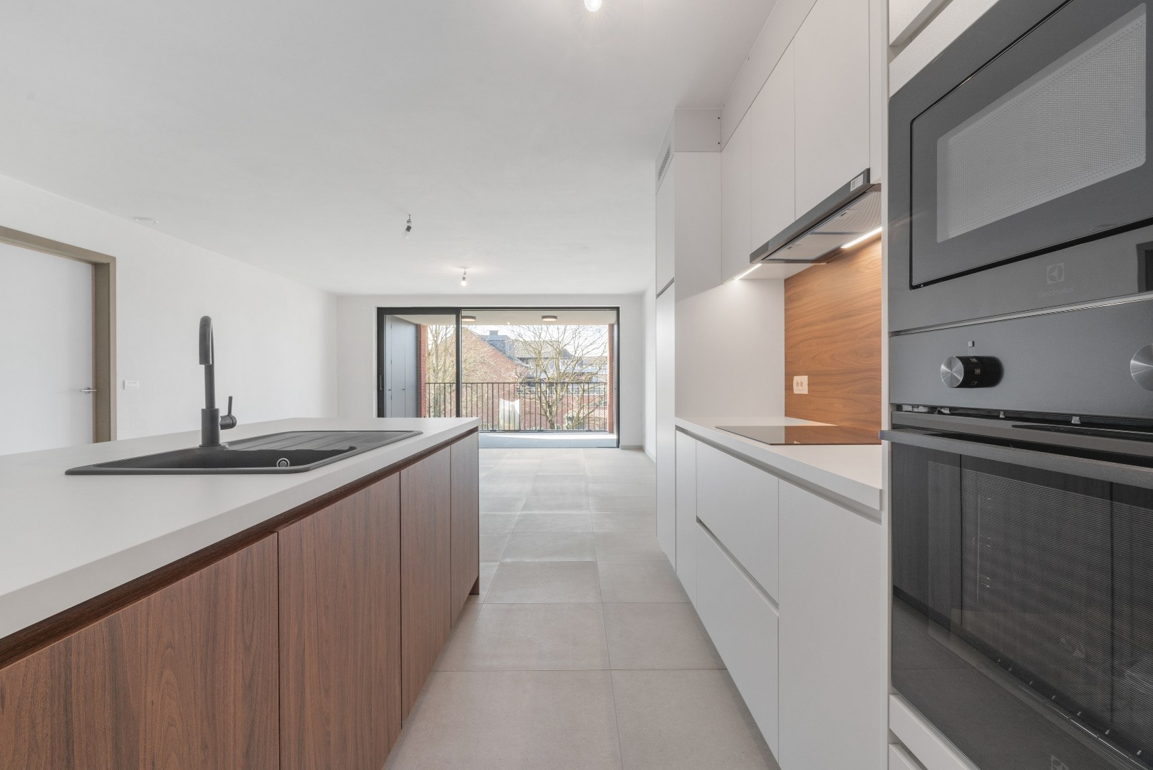 Nieuwbouwappartement met één slaapkamer, terras en ondergrondse autostaanplaats te koop in Zulte 