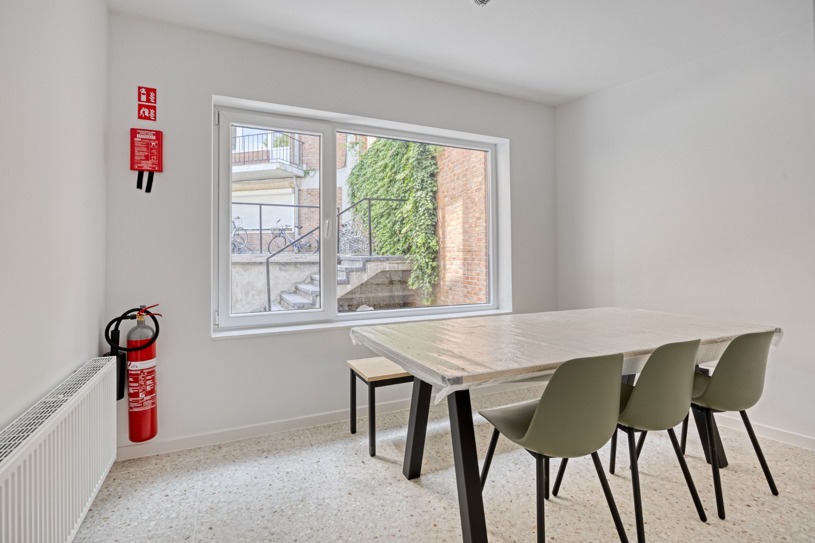 Volledig gerenoveerde studentenkamer in residentie met 29 studentenkamers met eigen sanitair en terras in hartje Leuven - EPC label A! 