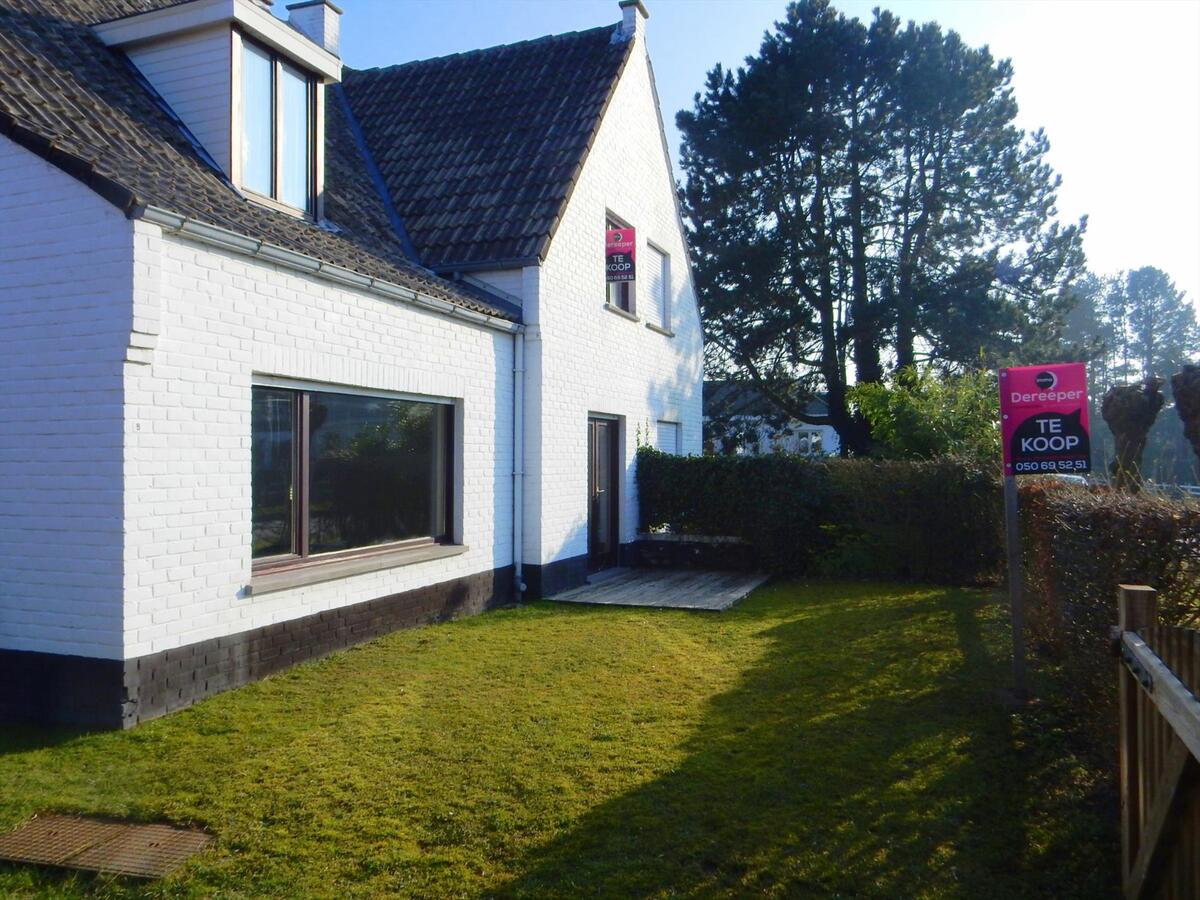 Charmante half-open woning op rustige ligging 