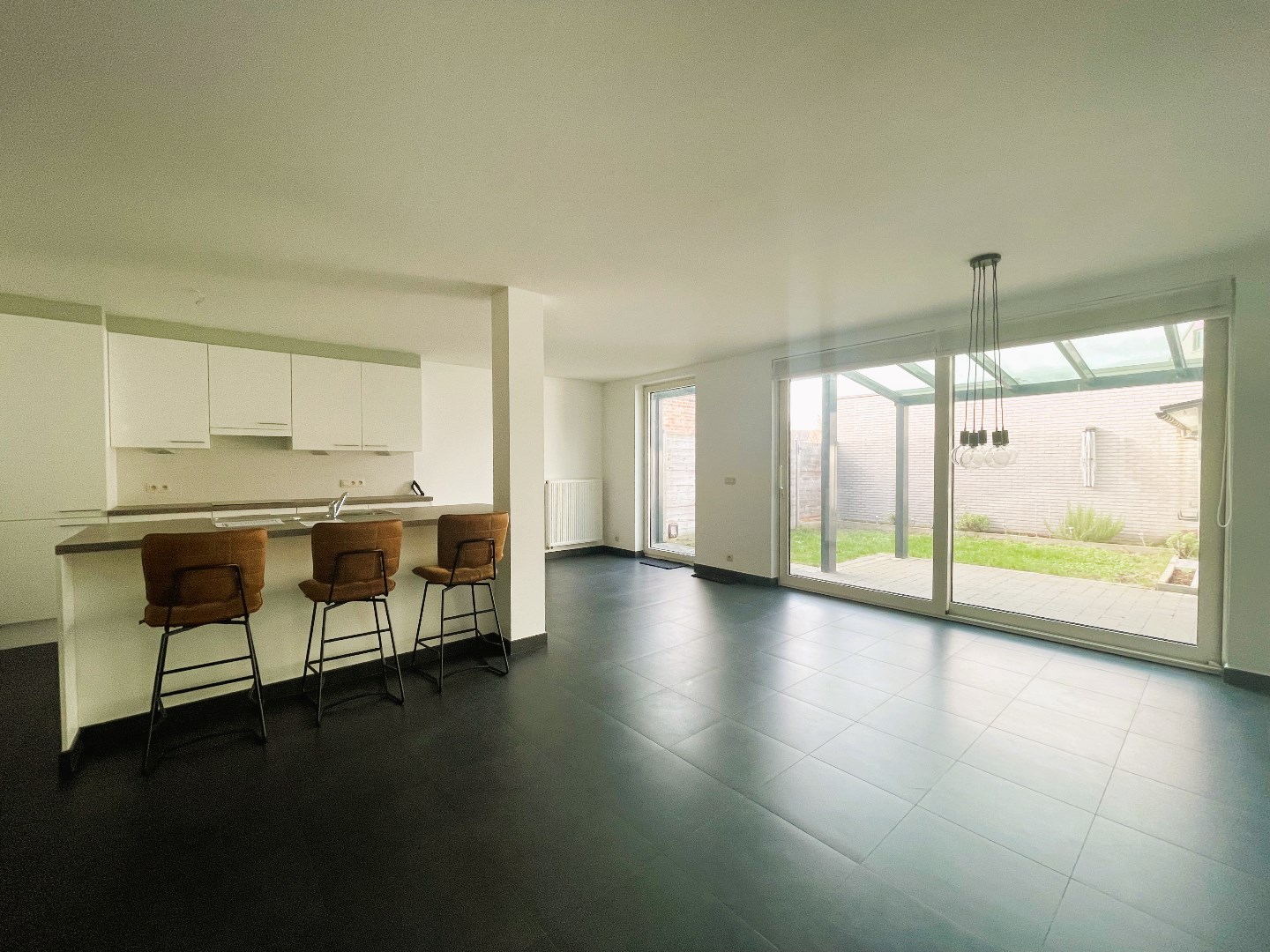 Gelijkvloers appartement met 2 slaapkamers en aangename tuin 