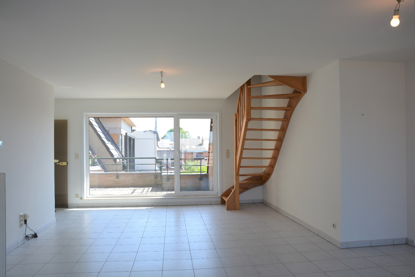 Lichtrijk duplex-appartement met 2 terrassen in het centrum 