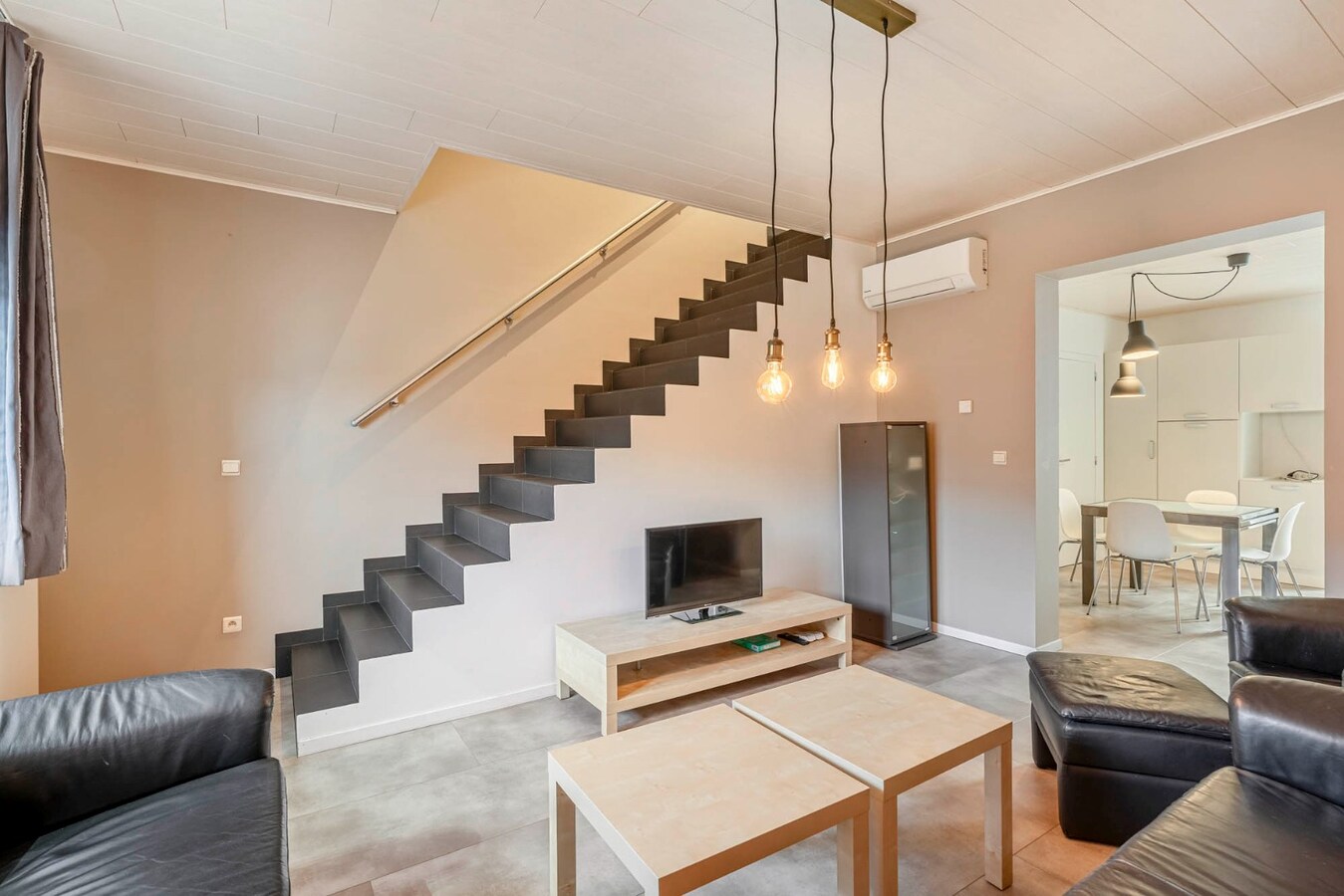 Energiezuinig 1-slaapkamerappartement met private toegang en knusse patio, centrum  Opglabbeek - interessante investeringsopportuniteit. 