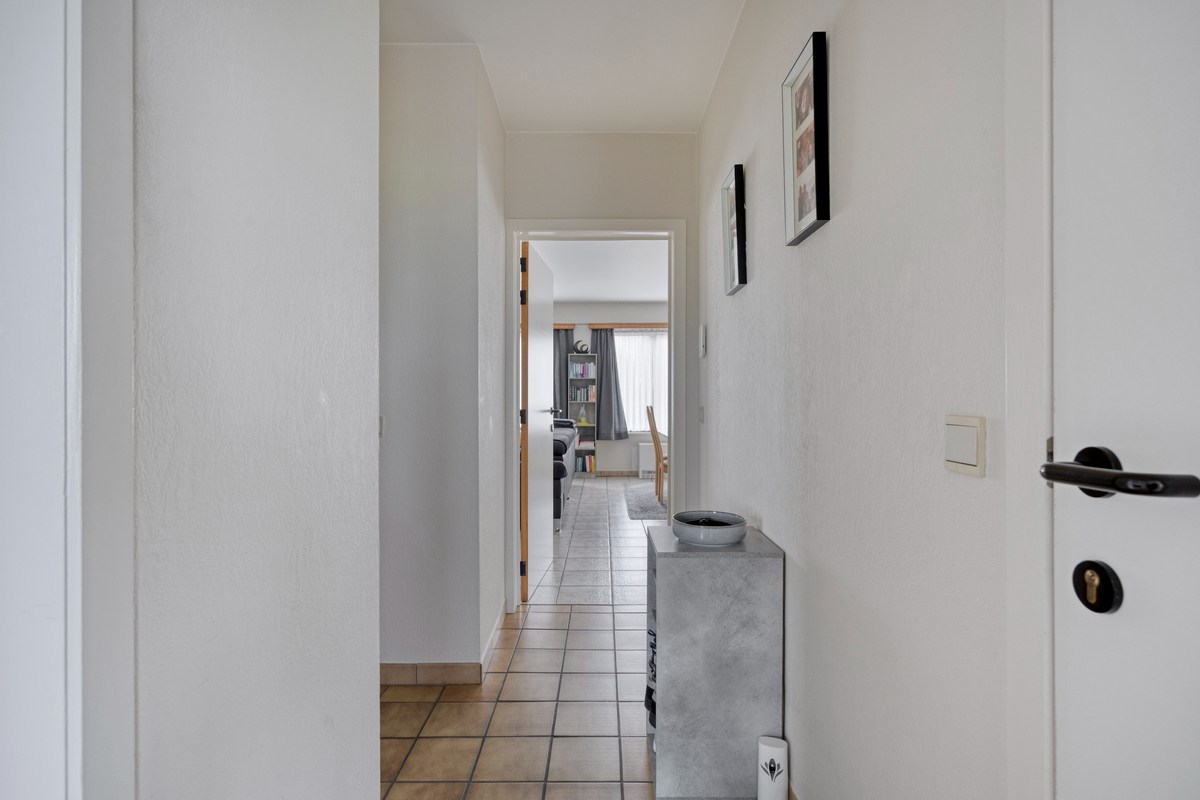 Opbrengsteigendom met 3 appartementen en 7 garages 