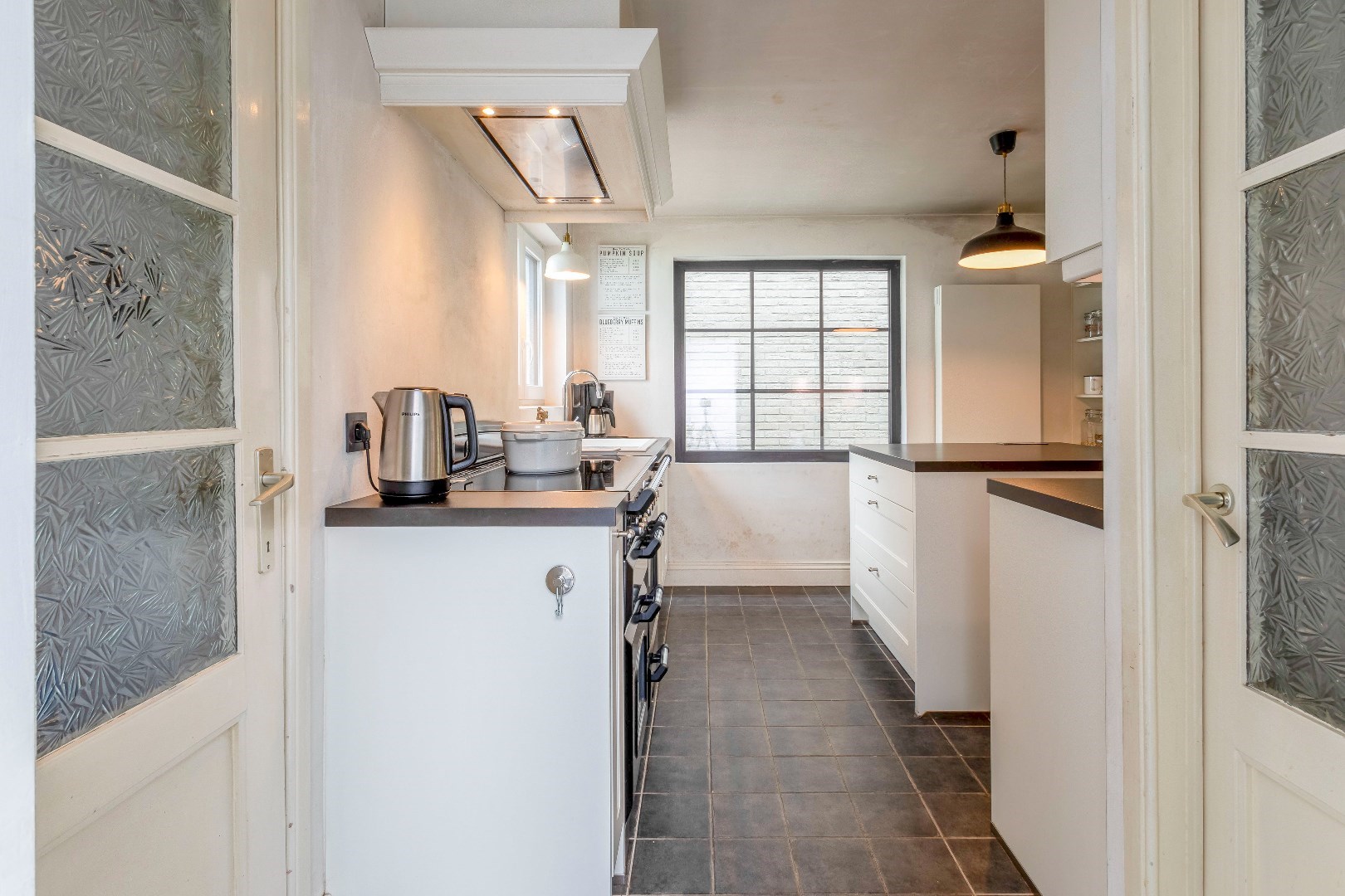 Instapklare woning met tuin in de gezellige kern van Laarne 