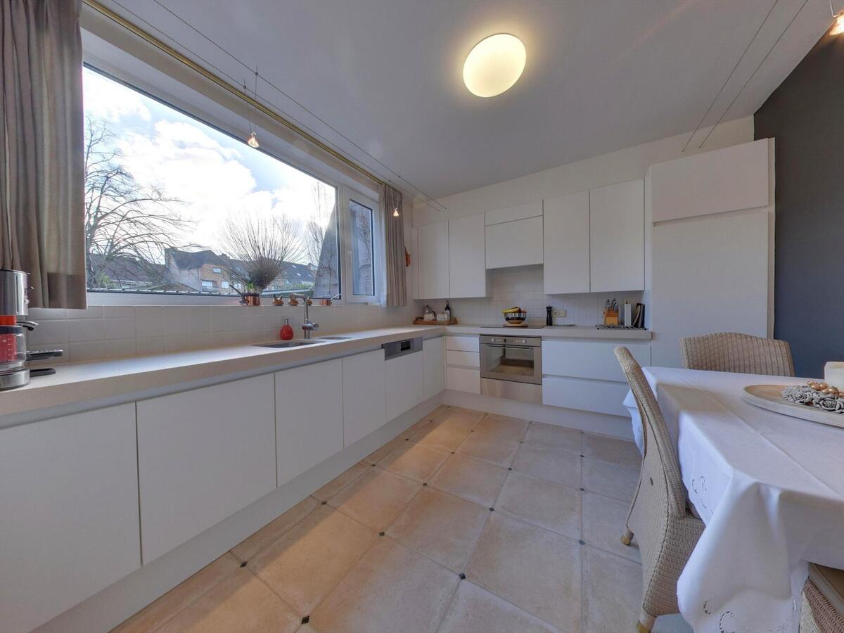 Gelijkvloers appartement met zuidgerichte tuin 