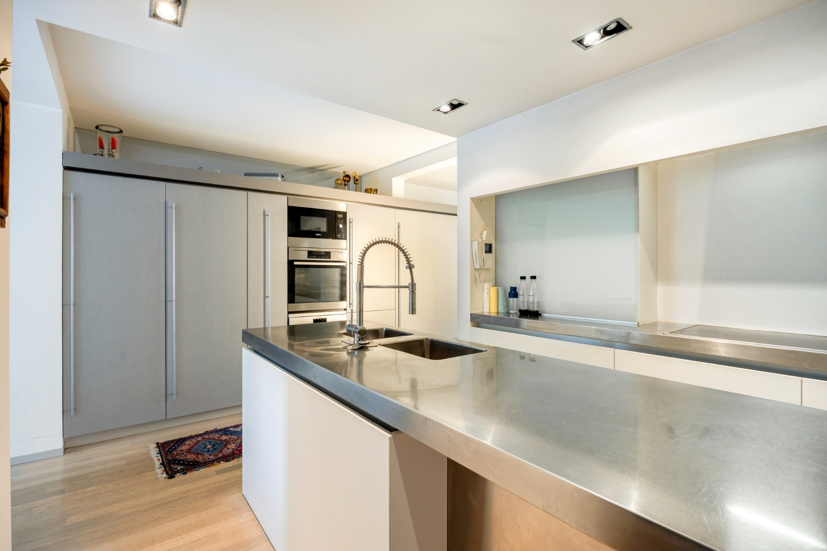 Gelijkvloers appartement met een terras van 50m²,  3 slaapkamers en staanplaats in het centrum van Leuven! - bewoonbare opp. 147m² 