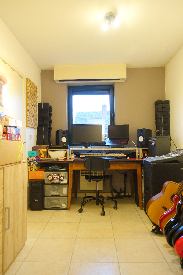 Gezellig gelijkvloersappartement met zonnige tuin en garage 