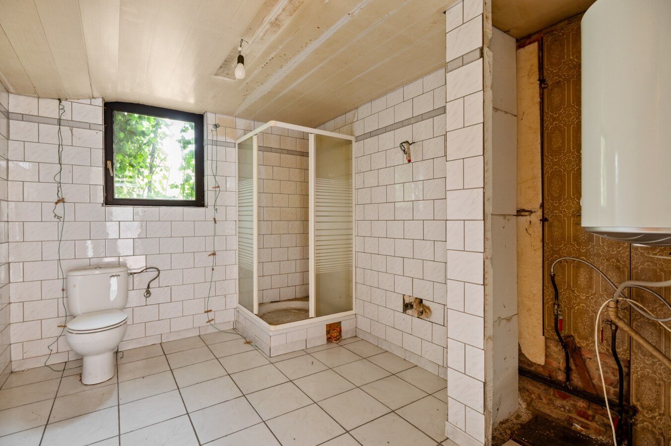 Te renoveren woning met 3 slpk en tuin te Boom! 